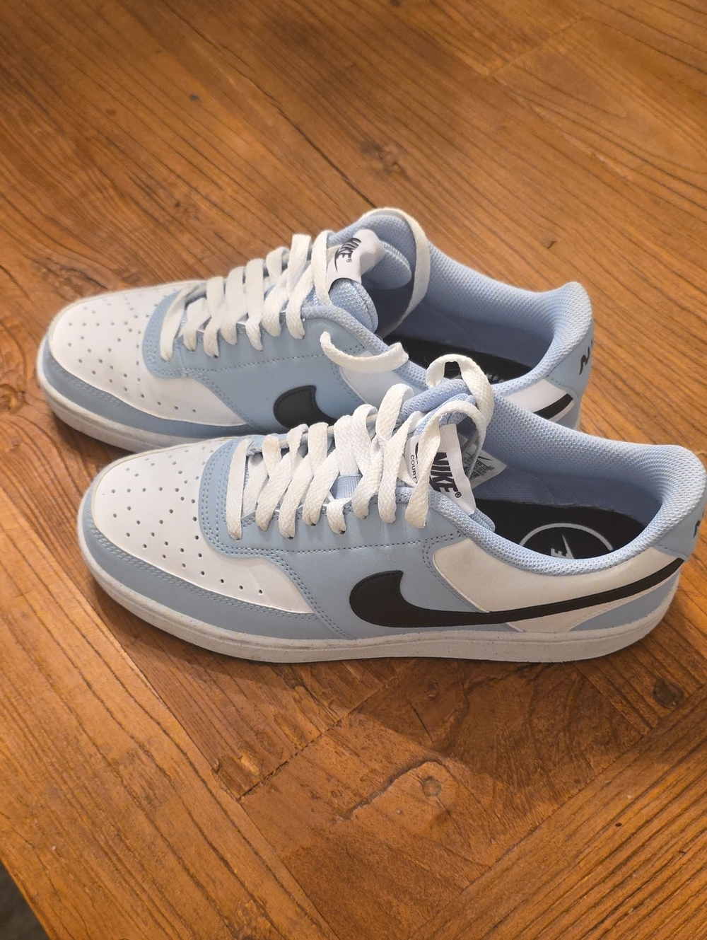 Nike Men’s Low-Top Sneakers in White, Light Blue and Black.